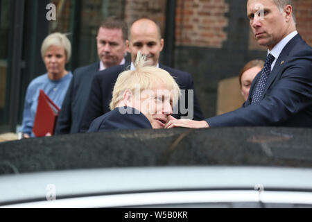 Manchester, UK, le 27 juillet, 2019. Premier ministre Boris Johnson de quitter le Musée des sciences et de l'industrie, Manchester, Royaume-Uni. Crédit : Barbara Cook/Alamy Live News Banque D'Images