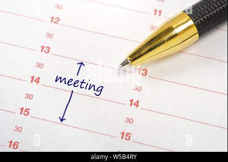 Réunion d'affaires dans le calendrier imprimé in office Banque D'Images