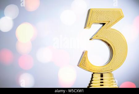 3ème placé runner up metallic gold trophy avec un numéro 3 sur 3D blanc avec copie espace et bokeh Banque D'Images