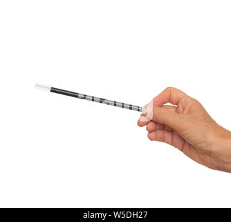 La main féminine avec des tours de magie noir et blanc isolé sur fond blanc. Banque D'Images