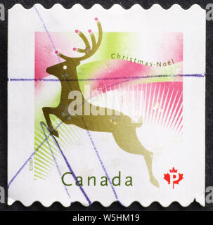 Cerf stylisé sur les timbres de Noël Banque D'Images