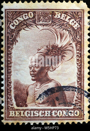 Le chef tribal vintage stamp du Congo Belge Banque D'Images