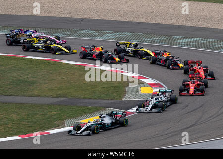 Les pilotes de Formule 1 concurrence dans la Formule 1 Grand Prix de Chine 2019 Heineken sur le Circuit International de Shanghai à Shanghai, Chine, le 14 avril 2019. Banque D'Images