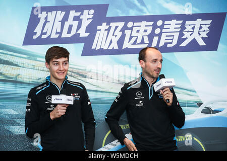 Pilote de Formule 1 Polonais Robert Kubica, droite, et pilote de Formule 1 britannique George Russell Williams de participer à l'équipe d'événement marque Rexona dans Shangh Banque D'Images