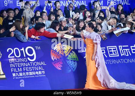 L'actrice Carina Lau Hong Kong comporte, elle arrive sur le tapis rouge pour le 9e Festival International du Film de Beijing 2019 à Beijing, Chine, 13 avril 2 Banque D'Images