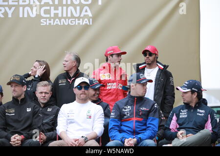 Les pilotes de course F1 poser pour des photos pour le 1000ème célébration de l'histoire en Chine au cours de la Heineken de Formule 1 Grand Prix de Chine 2019 au Shanghai Banque D'Images