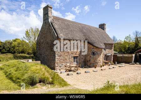 L'architecture typique de l'île - les caches vieille ferme datant du 15ème siècle, Les Villets, Guernsey, Channel Islands UK Banque D'Images