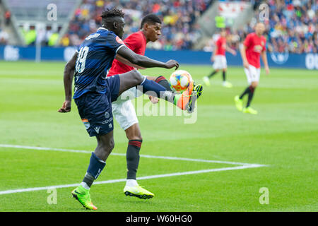 Aliou Coly suspend les défis de Marcus Rashford de Manchester le Unitedduring pré saison International Football match amical entre Kris Banque D'Images