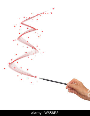 Baguette magique dans la main, s'épanouir en zigzag avec étoiles rouges. Isolé sur fond blanc. Banque D'Images