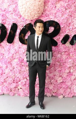 L'acteur chinois Huang Xuan assiste au défilé de mode de Dior Homme Paris pendant la Semaine de la mode pour hommes Printemps/été 2019 à Paris, France, 23 juin 2018. Banque D'Images