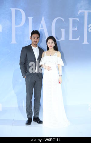 L'actrice chinoise Yang Mi, droite, et acteur taïwanais et le modèle Ethan Juan assister à un événement promotionnel pour Piaget à Beijing, Chine, 11 mai 2018. Banque D'Images