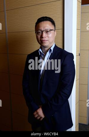 --FILE--Eric Jing Xiandong, chef de la Direction de la situation financière du Groupe d''Ant, pose pendant le Forum de Boao pour l'Asie à la Conférence annuelle 2016 Banque D'Images