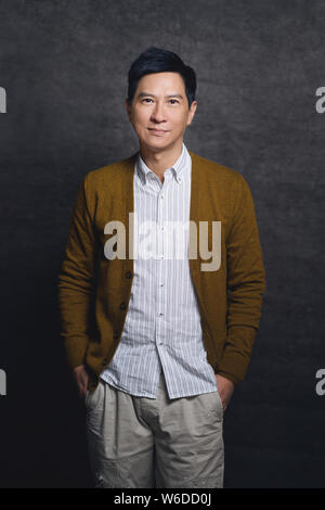 Hong Kong acteur Nick Cheung pose pour portrait photos au cours d'un entretien exclusif par Imaginechina à Beijing, Chine, 29 mars 2018. Banque D'Images