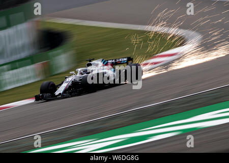 Les pilote de F1 Lance Stroll de Williams-Mercedes oriente sa voiture au cours de la séance de qualification pour le 2018 Grand Prix de Chine de Formule 1 à la S Banque D'Images