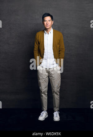 Hong Kong acteur Nick Cheung pose pour portrait photos au cours d'un entretien exclusif par Imaginechina à Beijing, Chine, 29 mars 2018. Banque D'Images