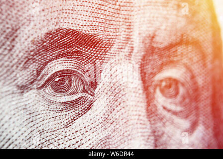 Dolar USA close up. Franklin yeux macro. La texture du fragment du dollar. Billets USD la texture. Une centaine de dollars américains. $ 100. Banque D'Images