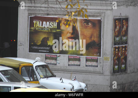 Talaash movie poster mounted on wall, India Stock Photo