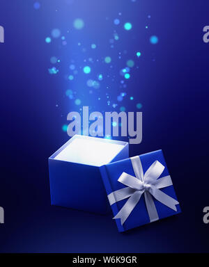 Blue open gift box avec lumière magique Banque D'Images