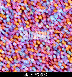 En effet bokeh couleurs rouge, orange, bleu, fuchsia, mauve, violet. Style Vintage Seamless texture Tile prêt carré Banque D'Images