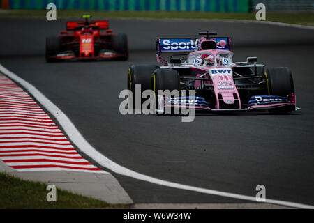 SportPesa Point course F1 Team pilote mexicain Sergio Perez fait concurrence au cours de la première session de la pratique de l'Hungarian Grand Prix de F1. Banque D'Images