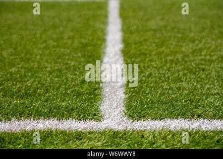 La texture de gazon artificiel le couvert herbacé terrain de sport. Il est utilisé dans différents sports : football, tennis, baseball, soccer, football américain, cricket, g Banque D'Images