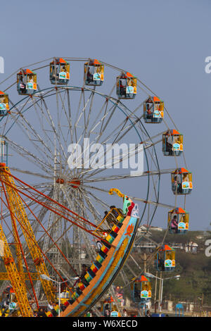 Tourists enjoying ferris wheel ride at Surajkund Crafts Mela, Surajkund, Faridabad, Haryana, India Stock Photo