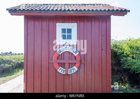 Ursholmen, Suède - Juillet 26, 2019 : Avis d'une bague avec l'inscription dans le Nationakpark Ursholmen Kosterhavet dans l'ouest de la Suède. Banque D'Images
