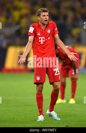 Dortmund, Allemagne. 06Th Aug 2019. Soccer : DFL Supercup, Borussia Dortmund - Bayern Munich en parc Signal Iduna. Bavaria's Thomas Müller se plaint. Credit : Marius Becker/dpa/Alamy Live News Banque D'Images