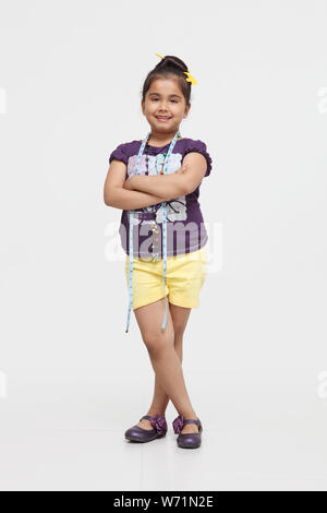 Girl dressed up as a fashion designer Stock Photo