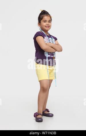Girl dressed up as a fashion designer Stock Photo