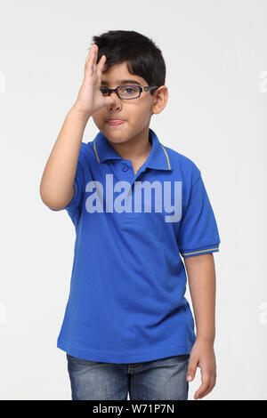 Indian boy making a funny face Banque D'Images