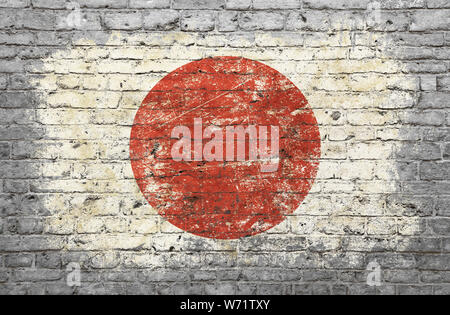 Grunge affligé d'un drapeau japonais peint sur old weathered gray brick wall Banque D'Images