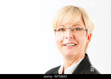 Senior business woman wearing eyeglasses Banque D'Images