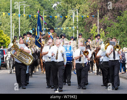 La bande d'argent et Selkirk Cornet Christopher Purves diriger l'équitation 2019 Commune de Lauder. Lauder, Scottish Borders, Berwickshire, UK - 3 août 2019 Banque D'Images