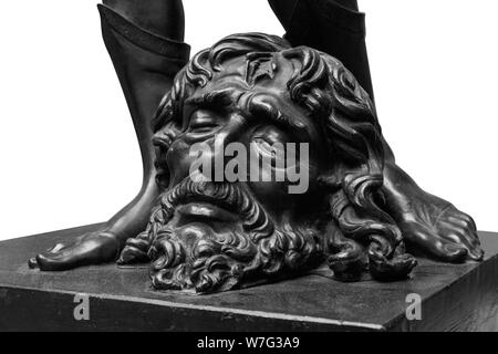 Les jambes de David avec la tête de Goliath, statue isolé sur blanc. Banque D'Images