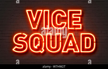 Vice squad neon sign on brick wall background Banque D'Images