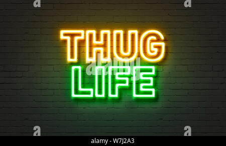 Thug life neon sign on brick wall background Banque D'Images