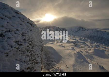 Bien briser les nuages de neige. Le Parc National de Cairngorms, en Écosse, décembre 2011. Banque D'Images