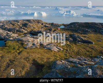 Image aérienne drone Icebergs Vue de dessus - le changement climatique et le réchauffement climatique. Les icebergs de la fonte des glaciers dans la région de icefjord Ilulissat, Groenland. Arctic Banque D'Images