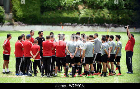 Les joueurs de Jordan national men's football team prendre part à une séance de formation pour un match amical contre Hong Kong men's football team à Hong Kong Banque D'Images