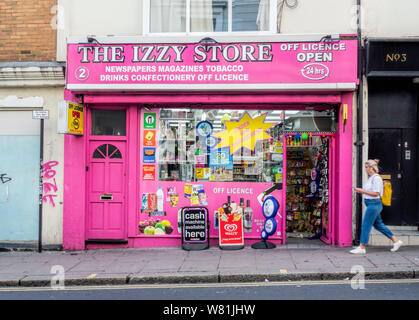 Boutique rose vif/l'Izzy Store Off Licence, Brighton East Sussex Banque D'Images