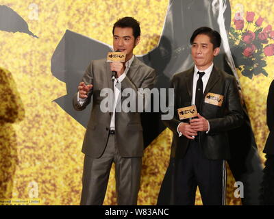Hong Kong l'acteur Tony Leung Chiu-wai, droite, et Taiwanese-Japanese Takeshi Kaneshiro acteur assister à un événement de bienfaisance premiere pour leur nouveau film "Yo Banque D'Images