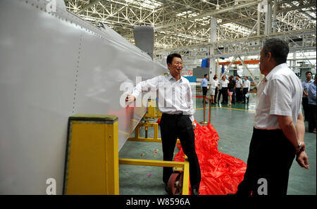 Vous pourrez regarder le premier gouverne pendant la cérémonie de livraison de la gouverne de produites en Chine pour du nouveau Boeing 737 Dreamliner MAX et avions 787-10 Banque D'Images
