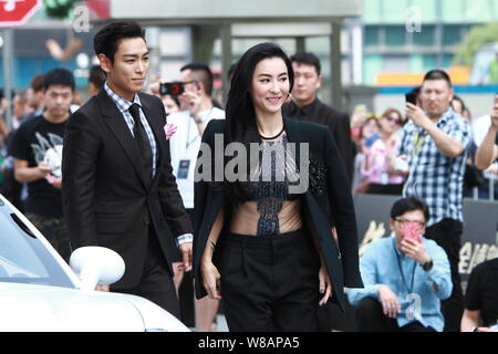 L'actrice Cecilia Cheung de Hong Kong, à droite, et le chanteur et acteur Choi Seung-hyun, mieux connu sous le nom de T.O.P, de la bande de garçon de la Corée du Sud Les fatals picards Banque D'Images