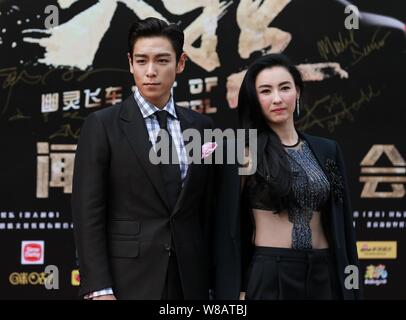 L'actrice Cecilia Cheung de Hong Kong, à droite, et le chanteur et acteur Choi Seung-hyun, mieux connu sous le nom de T.O.P, de la bande de garçon de la Corée du Sud Les fatals picards Banque D'Images