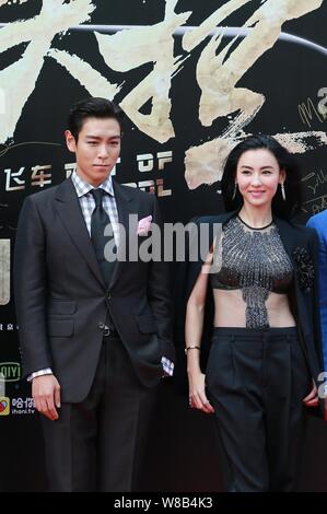 L'actrice Cecilia Cheung de Hong Kong, à droite, et le chanteur et acteur Choi Seung-hyun, mieux connu sous le nom de T.O.P, de la bande de garçon de la Corée du Sud Les fatals picards Banque D'Images