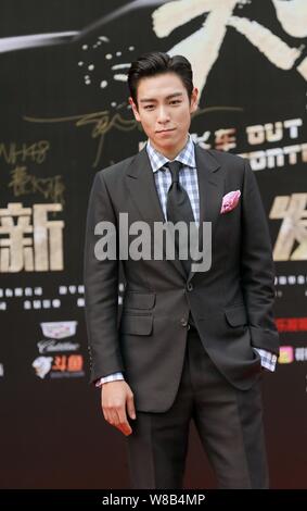 Chanteur et comédien Choi Seung-hyun, mieux connu sous le nom de T.O.P, de la bande de garçon de la Corée du Sud Les fatals picards (Big Bang), arrive à une conférence de presse pour Banque D'Images