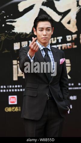 Chanteur et comédien Choi Seung-hyun, mieux connu sous le nom de T.O.P, de la bande de garçon de la Corée du Sud Les fatals picards (Big Bang), arrive à une conférence de presse pour Banque D'Images