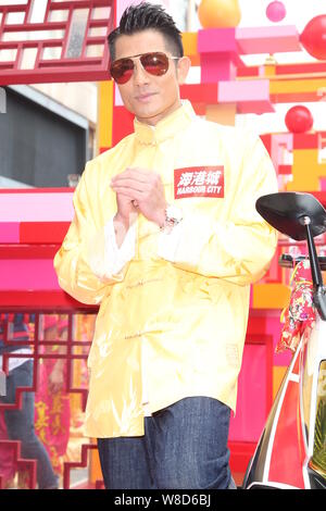 Hong Kong, chanteur et acteur Aaron Kwok pose comme il arrive pour un événement promotionnel par Harbour City pour célébrer la fête du printemps et la Lune chinoise N Banque D'Images