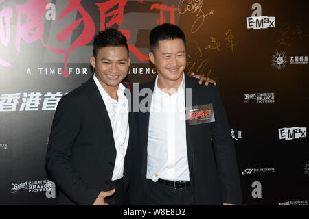 L'acteur chinois Wu Jing, droite, et acteur thaïlandais Tony Jaa posent au cours d'une première pour leur film "PL 2 : un temps pour ses conséquences" à Hong Kong, Chine, 8 J Banque D'Images